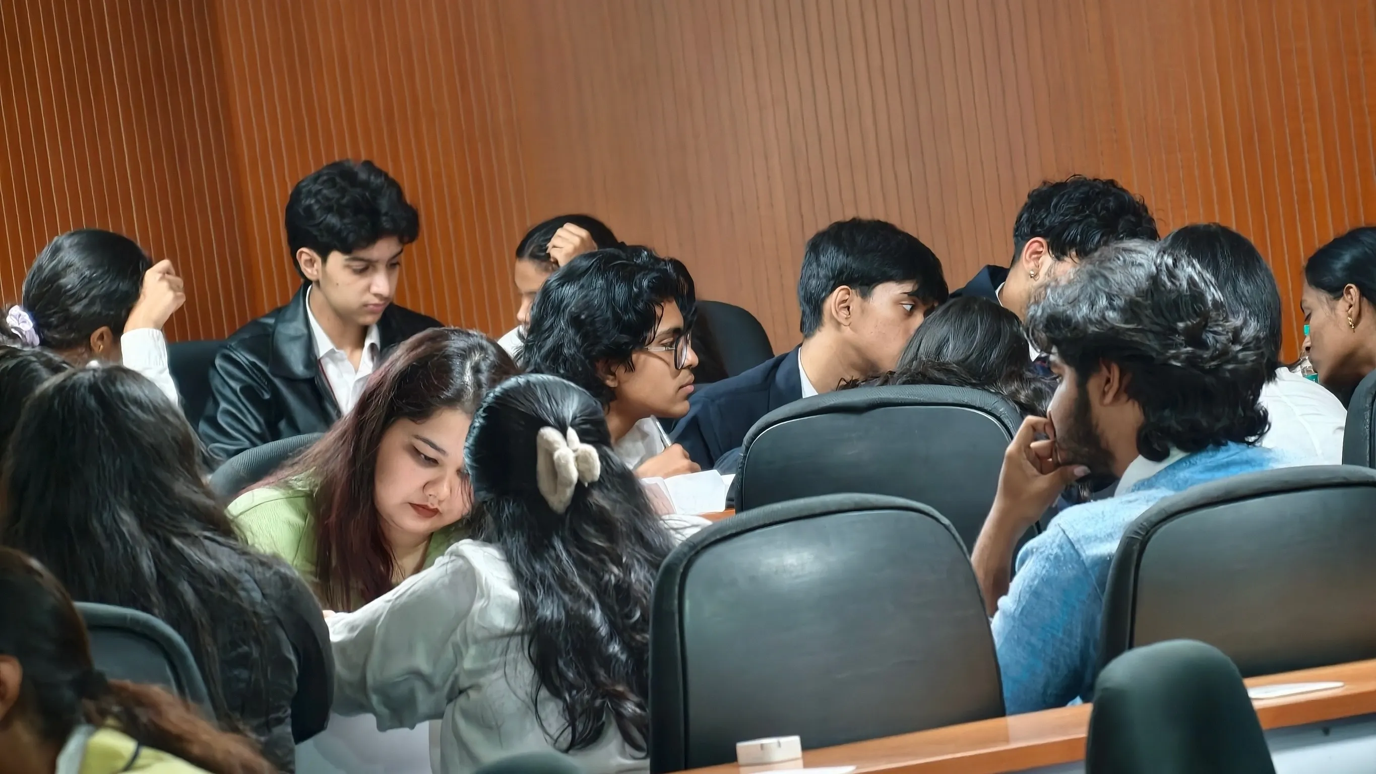 Students learning and working together in a live cohort