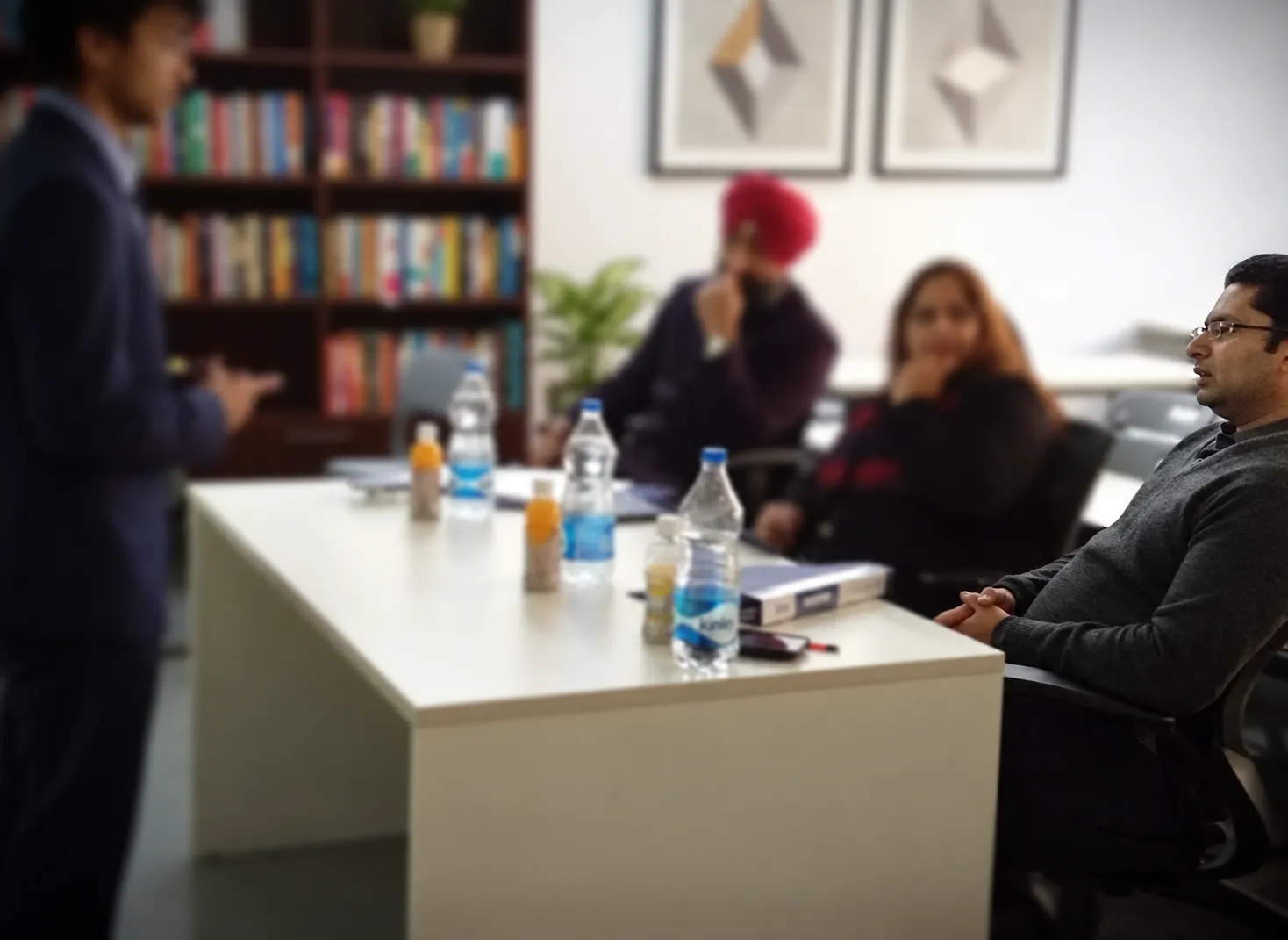 A participant being observed during a facilitated professional workshop